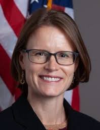 Professional business woman headshot, tech industry leadership profile