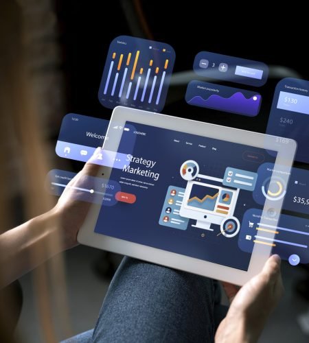 Person using tablet with digital analytics dashboard interface